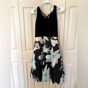 Moyabo sleeveless summer dress. Black and blue floral. Size Medium.